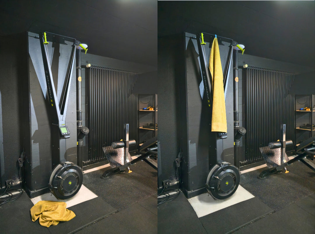Sporthandtuch mit blauem GYMMONKY Magnetic Towel Clip am Rack im Fitnessstudio